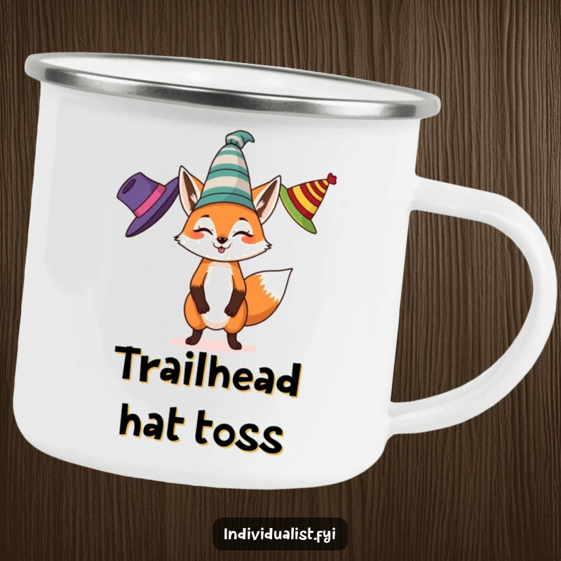 Funny camping mug featuring a spirited fox juggling three different colored, eccentric hats, perfect for outdoor relaxation and conversation.