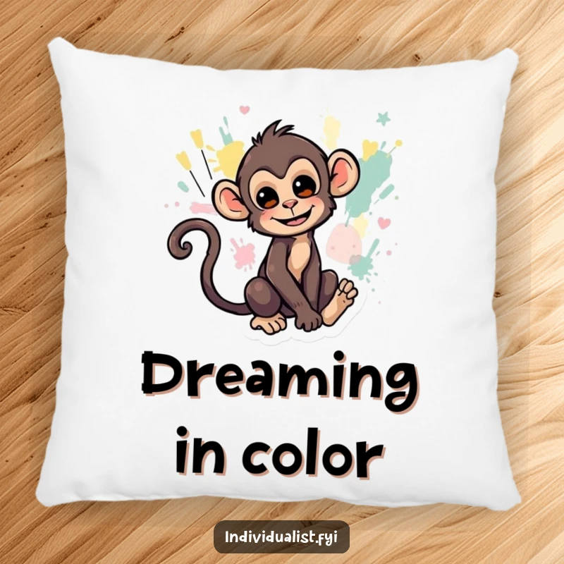Funny pillow showcasing a playful monkey painting abstract art with its tail, adding a touch of whimsical decor.