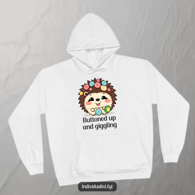 Funny hedgehog hoodie depicting a giggling hedgehog covered in an assortment of mismatched buttons, offering warmth and humor.