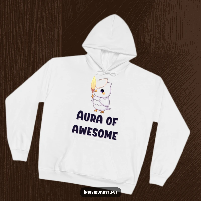 Funny Hoodie: A unique creature with a glowing aura proudly holds a hand-painted feather, offering cozy individuality.