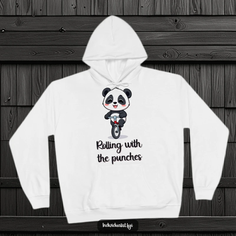Funny panda unicycle hoodie depicting a happy panda with a proud grin, balancing on a tiny unicycle for ultimate comfort.