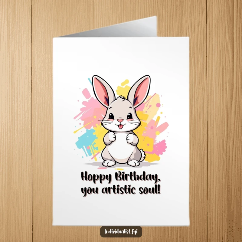 Funny Free Printable Birthday Card: A cheerful bunny joyfully painting an abstract masterpiece with its colorful paws.