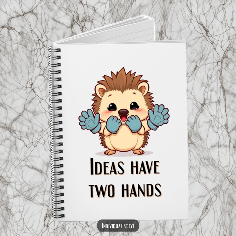 Funny hedgehog notebook featuring a cheerful character proudly displaying mismatched gloves, ideal for writing.