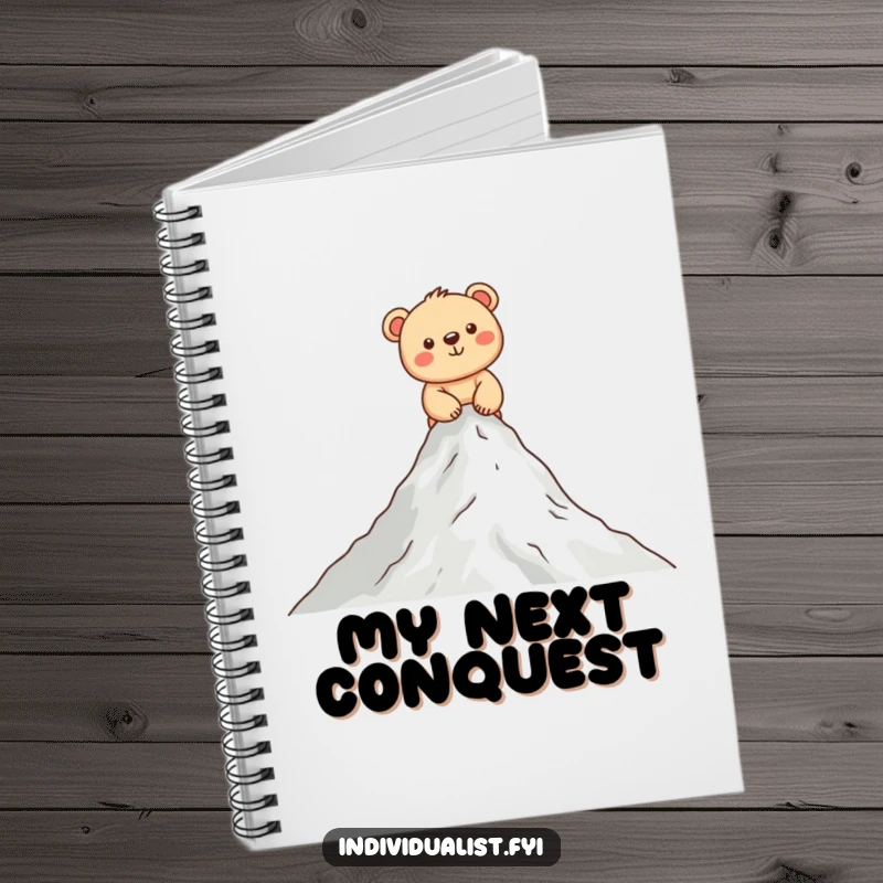 Funny bear cub notebook with a cheerful cub climbing a small mountain, perfect for jotting down ideas and funny notes.