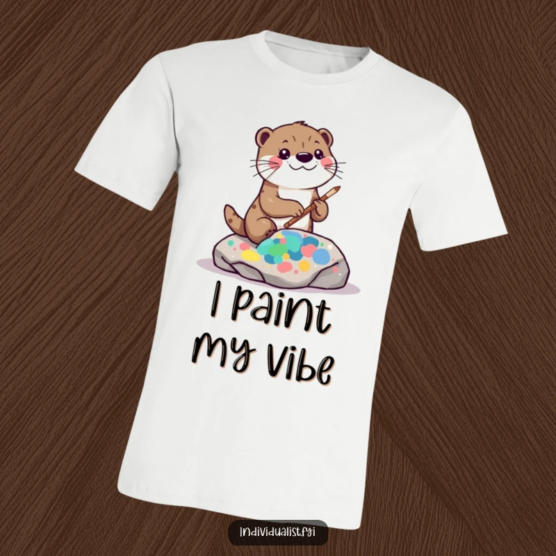 Funny kawaii otter t-shirt, depicting a playful otter creating a colorful, abstract pattern on a rock with artistic flair.