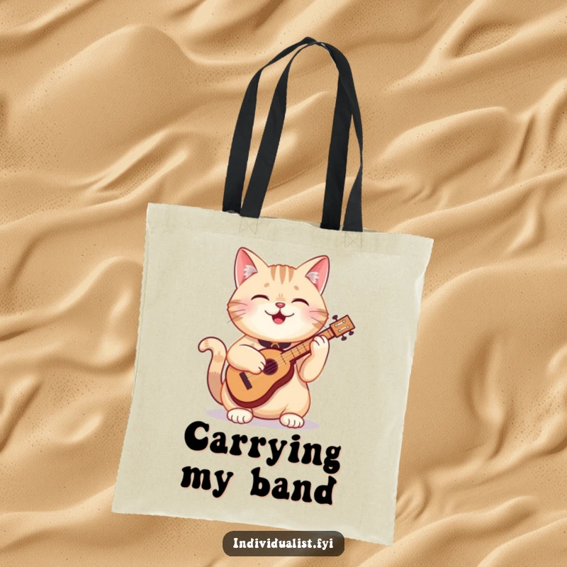 Funny cat tote bag showing a happy cat engrossed in playing a unique, miniature instrument, perfect for carrying books or groceries.